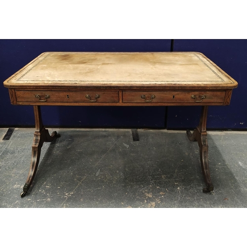 648 - Faded mahogany Regency writing table, ebonised stringing, the rectangular top with curved corners an... 