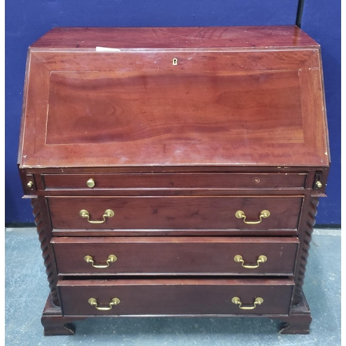 649 - 20th century mahogany bureau in the Georgian style, the fall front enclosing fitted interior above f... 