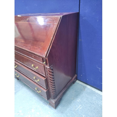 649 - 20th century mahogany bureau in the Georgian style, the fall front enclosing fitted interior above f... 