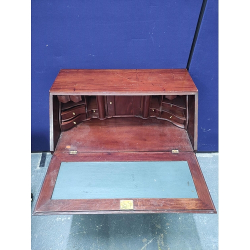 649 - 20th century mahogany bureau in the Georgian style, the fall front enclosing fitted interior above f... 