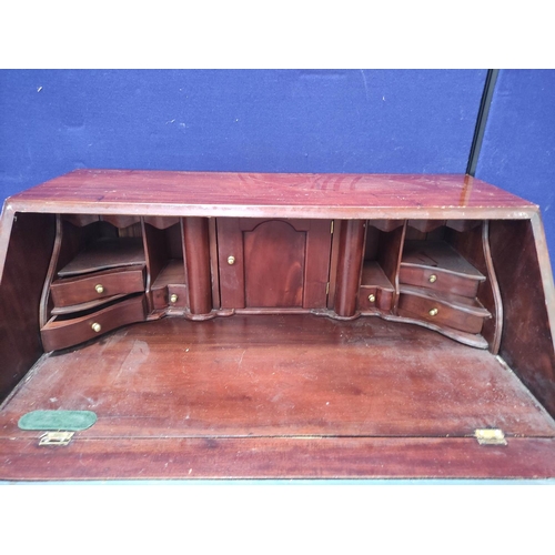 649 - 20th century mahogany bureau in the Georgian style, the fall front enclosing fitted interior above f... 