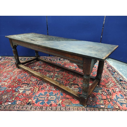 651 - Antique oak refectory table in the 17th century style with cleated triple plank top on foliate and r... 