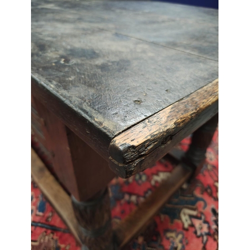 651 - Antique oak refectory table in the 17th century style with cleated triple plank top on foliate and r... 