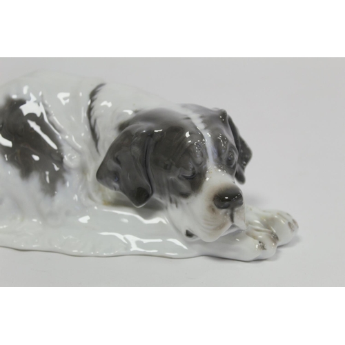 268 - Rosenthal porcelain figure of a dog, sleeping St. Bernard, no. K262/2, c.1922, 30cm long.