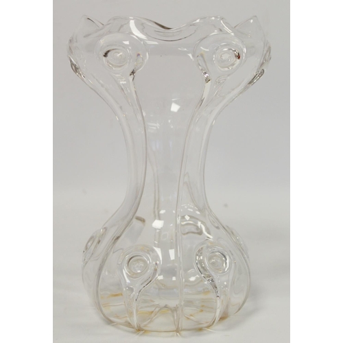 272 - Art Nouveau clear glass vase of waisted form with frilled rim and applied peacock type prunts in the... 