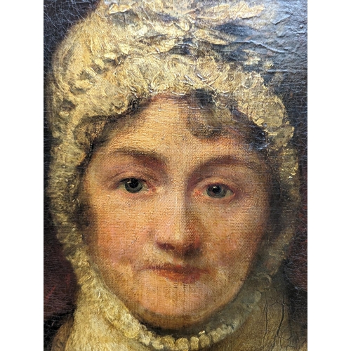 368 - 19th Century School.Portrait of a lady wearing lace bonnet.Oil on canvas.76cm x 63cm.... 