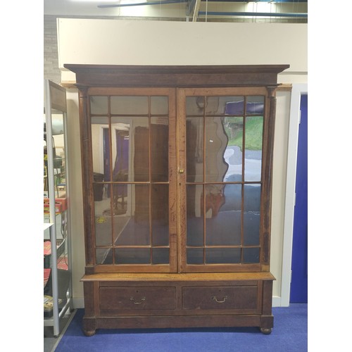 583 - Oak cabinet bookcase, c.1890's, the upper section with moulded pediment above glazed astragal doors ... 