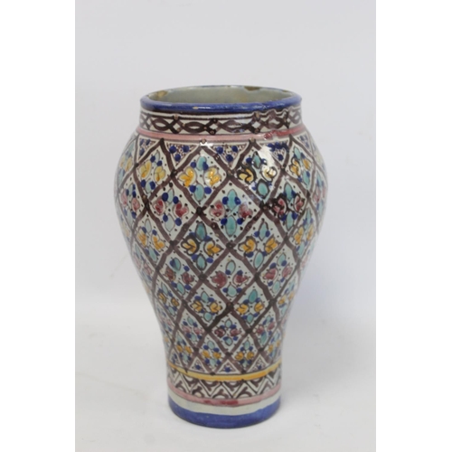 193 - Islamic Iznik style tin glazed earthenware vase of baluster form, probably Moroccan, with polychrome... 