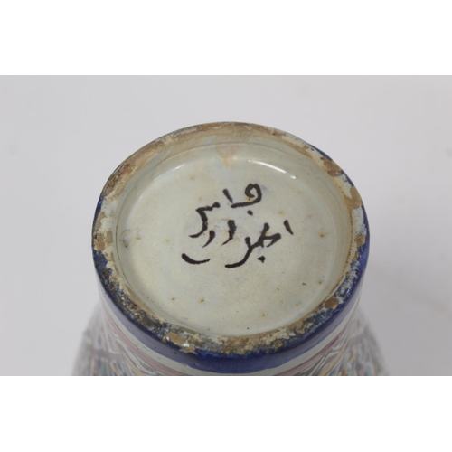 193 - Islamic Iznik style tin glazed earthenware vase of baluster form, probably Moroccan, with polychrome... 