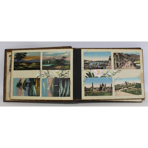 194 - Near pair of early 20th century Japanese lacquer photograph albums, one containing photographs inclu... 