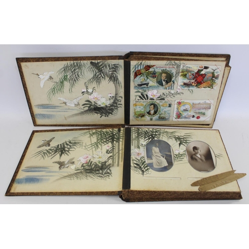 194 - Near pair of early 20th century Japanese lacquer photograph albums, one containing photographs inclu... 