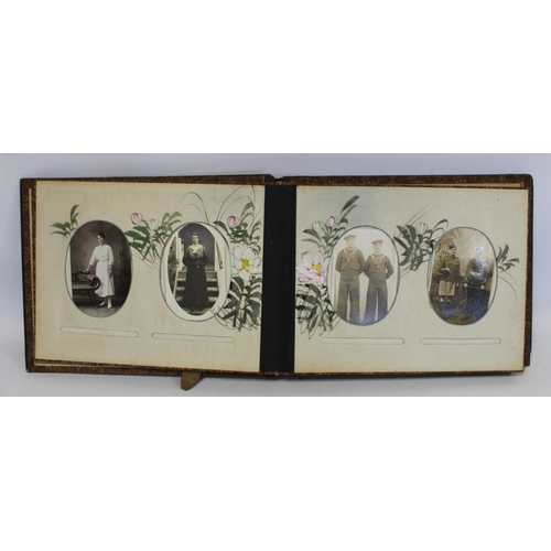 194 - Near pair of early 20th century Japanese lacquer photograph albums, one containing photographs inclu... 