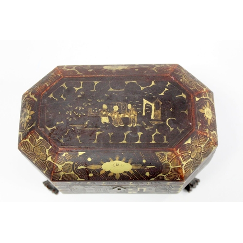 287 - 19th century Chinese black lacquer tea caddy of octagonal form with four paw feet and gilt painted p... 