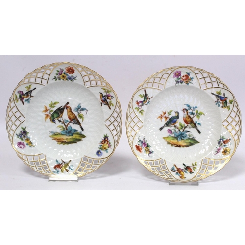 288 - Pair of KPM Berlin porcelain plates with hand painted polychrome enamel decoration of birds and flor... 