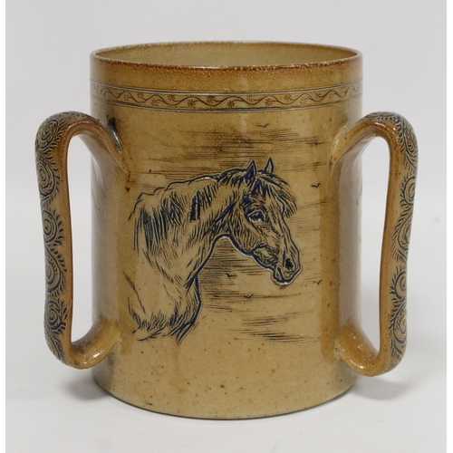 289 - Large Doulton Lambeth stoneware tyg by Hannah Barlow with sgraffito portraits of ponies, the three f... 