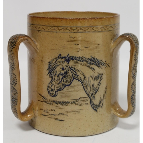 289 - Large Doulton Lambeth stoneware tyg by Hannah Barlow with sgraffito portraits of ponies, the three f... 