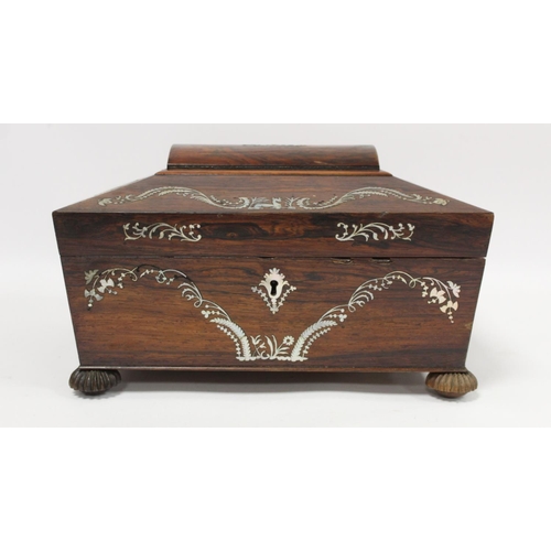 292 - Early 19th century Regency rosewood workbox of twin handled sarcophagus form on four reeded bun feet... 