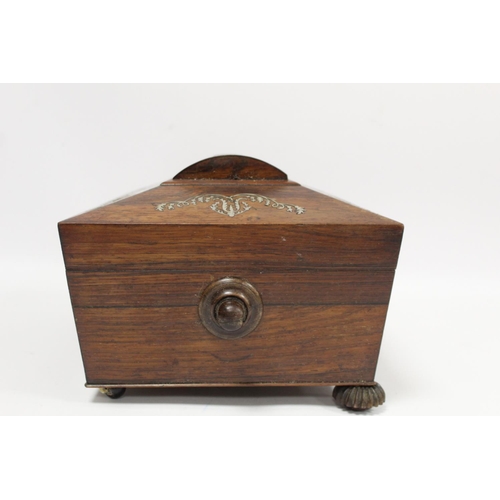 292 - Early 19th century Regency rosewood workbox of twin handled sarcophagus form on four reeded bun feet... 