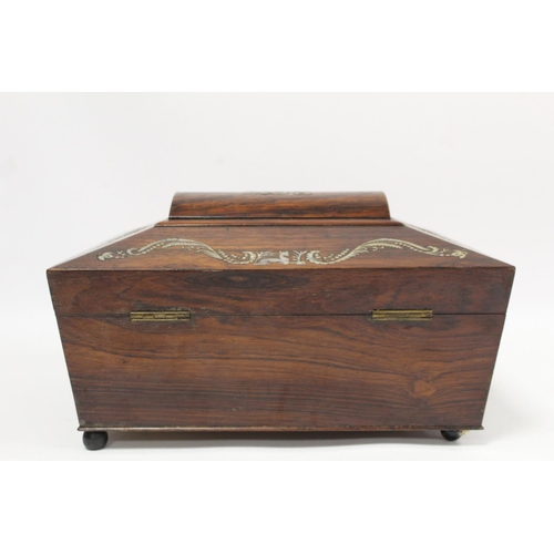 292 - Early 19th century Regency rosewood workbox of twin handled sarcophagus form on four reeded bun feet... 