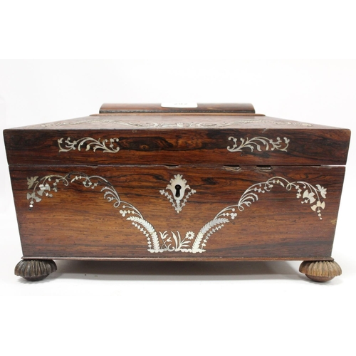 292 - Early 19th century Regency rosewood workbox of twin handled sarcophagus form on four reeded bun feet... 