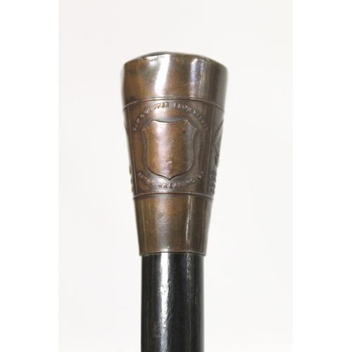 293 - Late 19th/early 20th century gentleman's ebonised walking cane, made from oak and copper taken from ... 