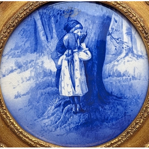 376 - 19th century Delft porcelain blue and white convex plaque depicting two children hiding by a tree, 1... 