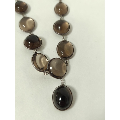 126 - Smoky quartz and silver graduated bead necklet, with drop.