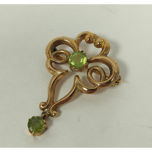 128 - Edwardian peridot brooch pendant in 9ct gold.