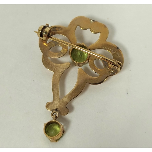 128 - Edwardian peridot brooch pendant in 9ct gold.