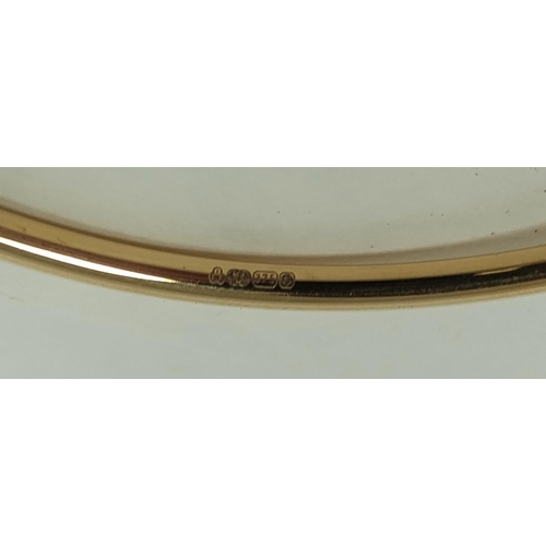 86 - 9ct gold hinged bangle, 4.3g.