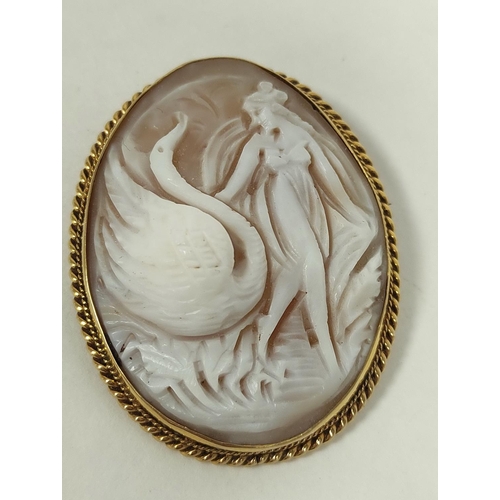 99 - Cameo brooch carved with Leda and the swan, 9ct gold.