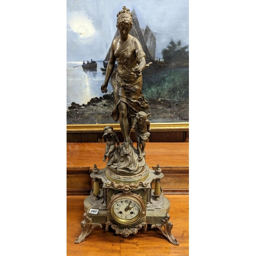 397 - French gilt spelter and onyx figural mantle clock, the top with a standing female allegorical figure... 