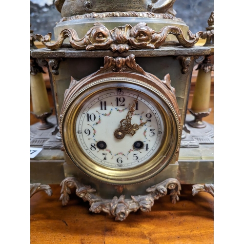 397 - French gilt spelter and onyx figural mantle clock, the top with a standing female allegorical figure... 