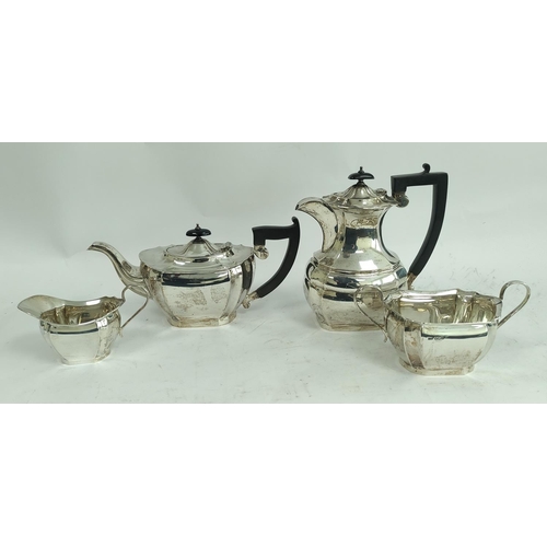 101 - Silver four-piece near matching tea set of boat shape with incurved edges, by Viners Sheffield 1931,... 