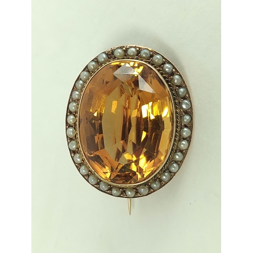 104 - Victorian gold oval brooch with citrine and pearls, probably 15ct.