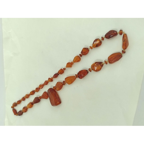 108 - Amber necklace of tablet links with drops, 85g and another. (2).