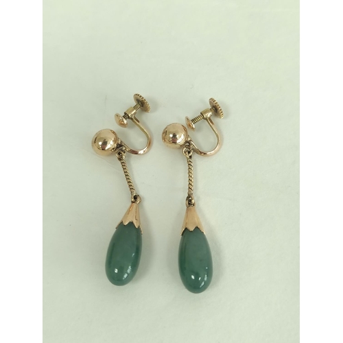 133 - Three pairs of cultured pearl earrings and another jade. 