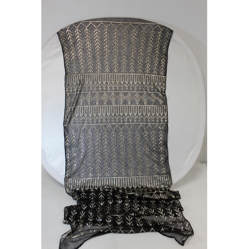 415 - Egyptian Assuit silver and black net shawl, approx. 240cm x 53cm; also a small beaded black and silv... 