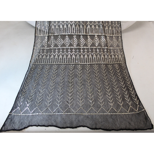 415 - Egyptian Assuit silver and black net shawl, approx. 240cm x 53cm; also a small beaded black and silv... 