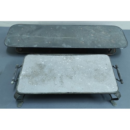 634 - Rectangular metal hot plate on scroll supports with two burners and a rectangular stand.  (2).