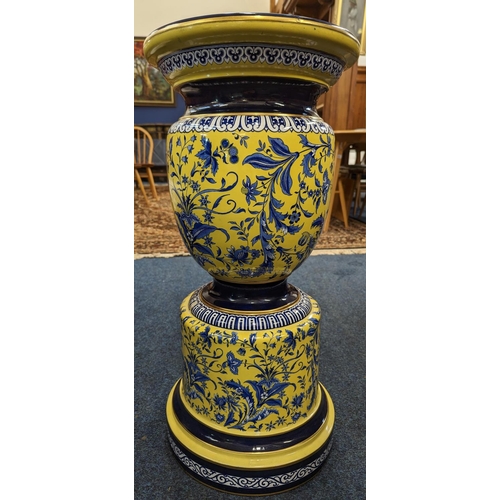 462 - 20th century pottery jardinière stand, the yellow ground decorated with blue floral spray, 71... 