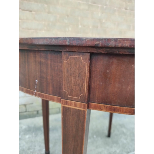 663 - Georgian mahogany card table with crossbanding raised on square tapering supports 91cm