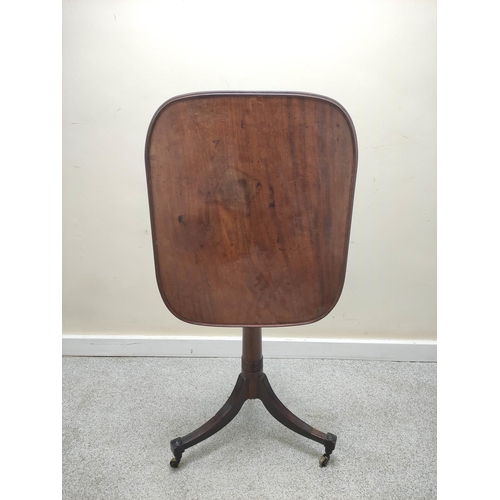 665 - Georgian mahogany tilt top wine table with rounded rectangular top raised on turned column. 60 x 50c... 