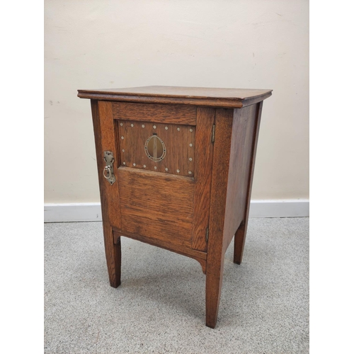 581 - Secessionist style oak bedside cabinet by Maples, with inlaid decoration, tapering square legs. 44cm... 