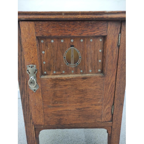 581 - Secessionist style oak bedside cabinet by Maples, with inlaid decoration, tapering square legs. 44cm... 