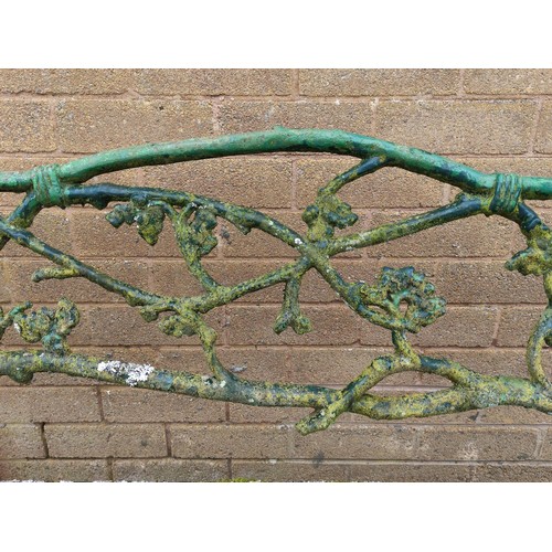 654 - Victorian Coalbrookdale style iron garden seat of overall foliate branch pattern with slatted wood s... 