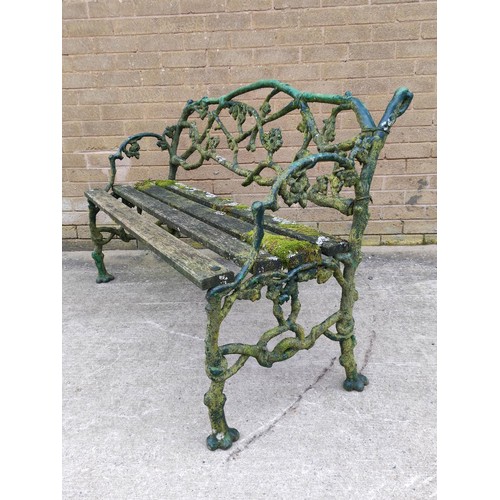 654 - Victorian Coalbrookdale style iron garden seat of overall foliate branch pattern with slatted wood s... 