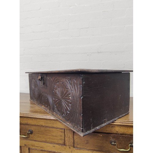 659 - 17th century oak bible box, with hinged top above iron lock/escutcheon, inscribed 'SS 1696', with ca... 