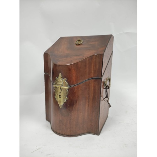 486 - Georgian mahogany knife box with sloping top, the shaped front with elaborate brass lock and hasp, o... 