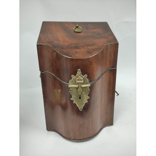 486 - Georgian mahogany knife box with sloping top, the shaped front with elaborate brass lock and hasp, o... 